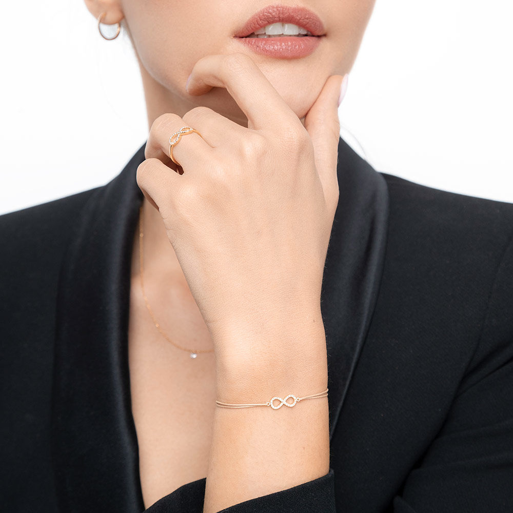 Freundschaftsarmband Infinity mit Diamanten, 18 Karat Gelbgold 